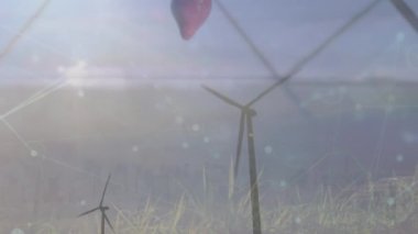 Yel değirmenleri üzerindeki bağlantı ağının animasyonu. Küresel bağlantılar, veri işleme kavramı dijital video oluşturuldu.