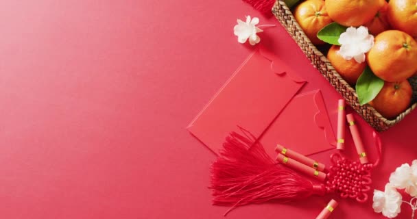 Vidéo Enveloppes Oranges Fleurs Sur Fond Rouge Nouvel Chinois Tradition — Video