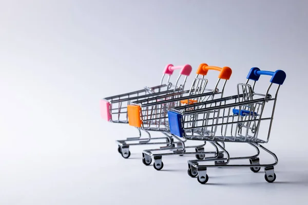 Composition Shopping Carts Copy Space White Background Retail Shopping Black — Stock Photo, Image