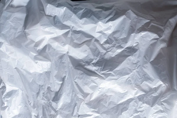 Отражая Свет Тень Складки Складки Резной Белой Восковой Бумаге Монохромный — стоковое фото