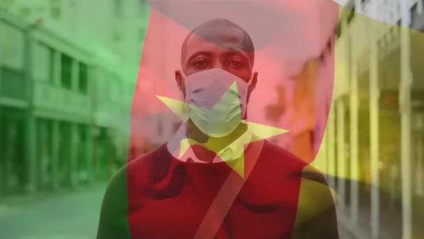 Animation Flag Cameroon Waving African American Man Wearing Face Mask — Stock Video