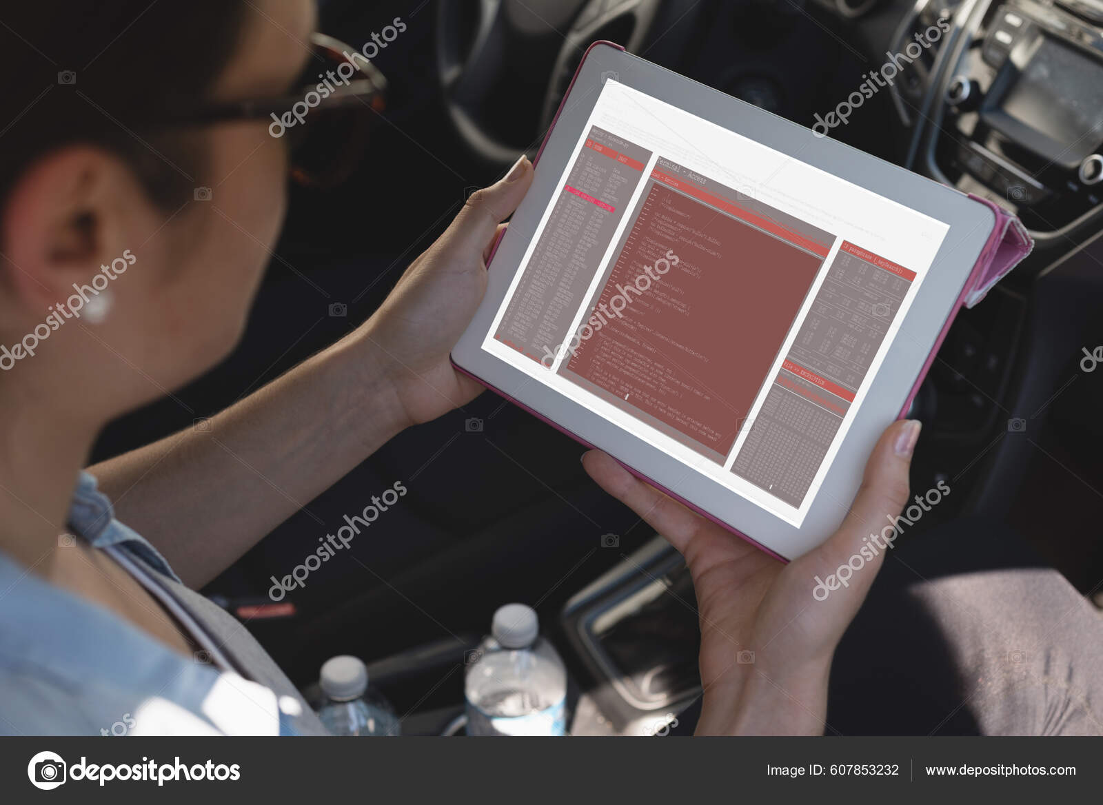 Biracial Female Programmer Sitting Car Holding Tablet Coding Screen ...