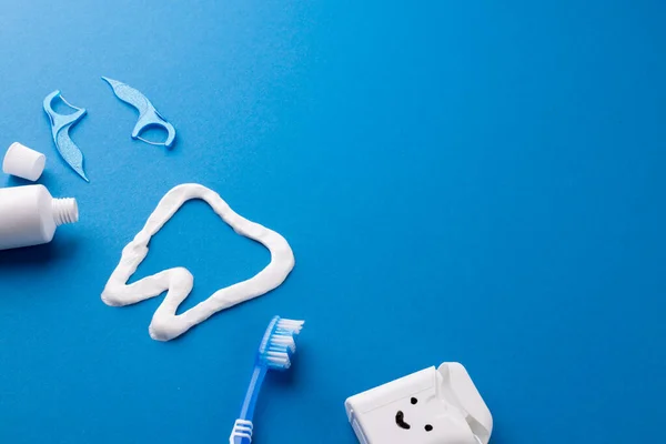 Image Toothbrush Toothpaste String Liquid Tooth Made Paste Blue Surface — Stock Photo, Image
