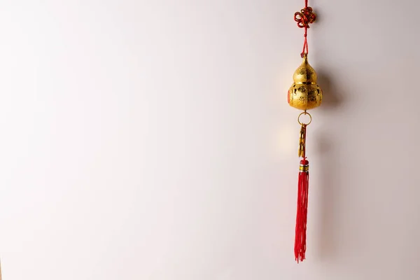 Composition of red chinese decoration on white background. Chinese new year, tradition and celebration concept.