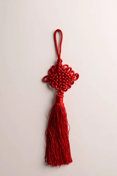 Composition of red chinese decoration on white background. Chinese new year, tradition and celebration concept.