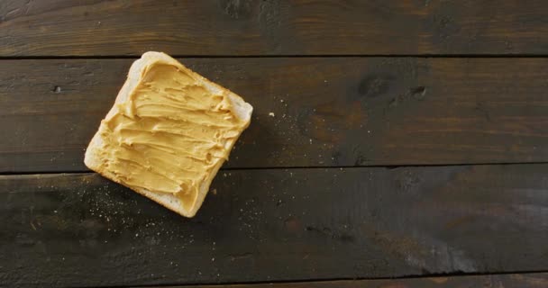 Video Close Toast Peanut Butter Wooden Background Food Party Copy — Stock Video