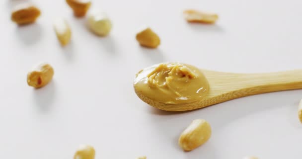Vídeo Close Manteiga Amendoim Fundo Branco Conceito Espaço Comida Festa — Vídeo de Stock