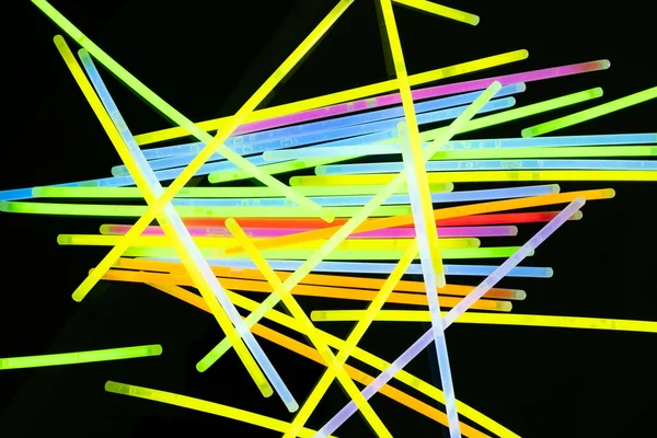 Image Vibrant Stack Neon Glow Sticks Scattered Black Background Light — Stock Photo, Image