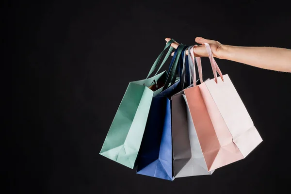 Composition Hand Holding Shopping Bags Gray Background Retail Shopping Black — Stock Photo, Image