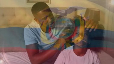 Kolombiya bayrağının Afro-Amerikan bir adam ve kızı üzerinde canlandırılması. Ulusal bayraklar ve vatanseverlik kavramı dijital olarak oluşturuldu.