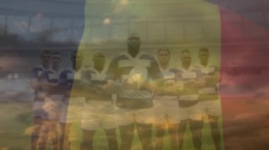Stadyumdaki çeşitli ragbi oyuncuları üzerinde Belçika bayrağı animasyonu. Ulusal bayraklar ve spor konsepti dijital olarak oluşturulmuş video.