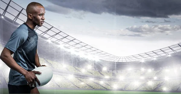 Composição Jogador Rugby Masculino Segurando Bola Rugby Sobre Estádio Esportivo — Fotografia de Stock