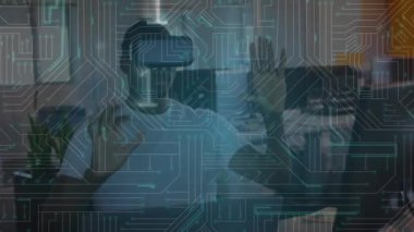 Animation of data processing over african american businessman using vr headset. Global business and digital interface concept digitally generated video.