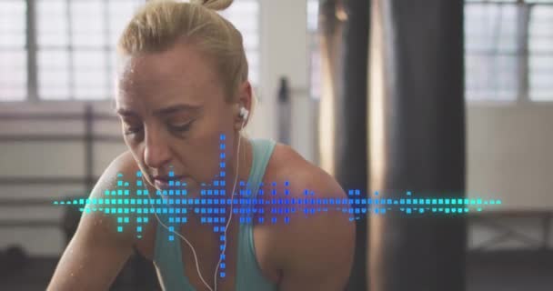 헬스클럽에서 이어폰을 코카서스 오디오 애니메이션 건강에 개념을 디지털로 비디오 — 비디오