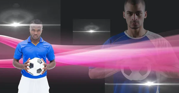 Composição Dois Jogadores Futebol Masculino Segurando Futebol Com Luzes Trilhas — Fotografia de Stock