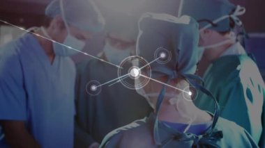 Hastanede ameliyat yapan cerrah ekibi üzerinden bağlantı ağının animasyonu. Tıbbi sağlık ve teknoloji konsepti