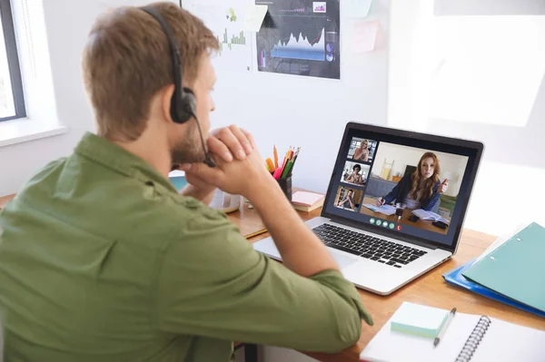 Caucasian Man Office Having Video Call Diverse Colleagues Displayed Laptop — Stock Photo, Image