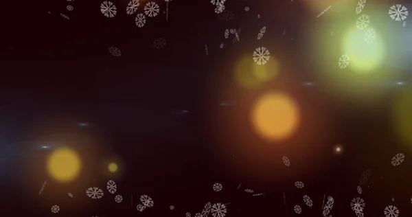 Kahverengi Arkaplana Düşen Kar Tanelerinin Işıkların Görüntüsü — Stok fotoğraf