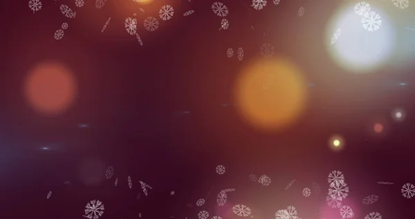 紫の背景に降る雪の結晶や光のイメージ — ストック写真