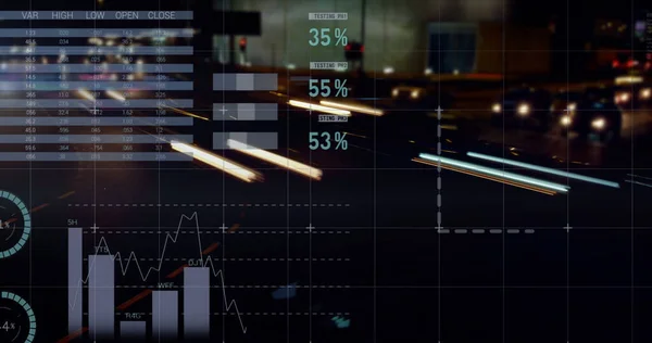 Image of statistical data processing against city traffic at night. Computer interface and business technology concept