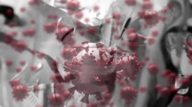 Tıbbi ekipman ve röntgenlerde düşen maskenin üzerinde süzülen makro Covid-19 hücrelerinin animasyonu. Covid-19 Coronavirus salgını sırasında tıbbi personel.