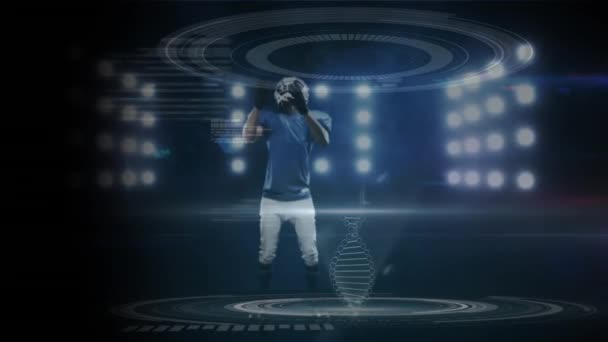 动画化3D Dna链和数据处理分析 一个美国足球运动员在泛光灯前跳跃和捕捉一个足球 — 图库视频影像
