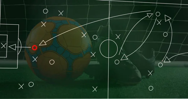 Image of strategy of soccer game over soccer ball and leather boots against net. Digital composite, multiple exposure, planning, symbols, sports and competition concept.