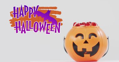 Gri arkaplanlı balkabağı kovası üzerine oyulmuş cadılar bayramı mesajı resmi. Cadılar Bayramı, sonbahar, sonbahar, bayram geleneği ve dijital olarak üretilen görüntü konsepti.