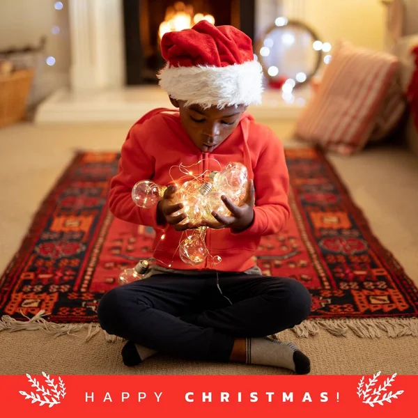 Samenstelling Van Vrolijke Kersttekst Afrikaanse Amerikaanse Jongen Kerst Feestconcept Digitaal — Stockfoto