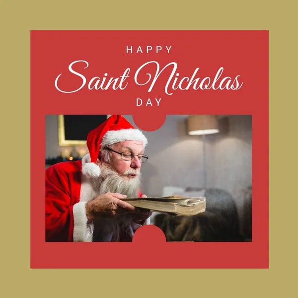 Composition of saint nicholas day text over santa claus blowing dust off book. Saint nicholas day, christmas festivity, tradition and celebration concept.