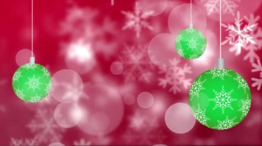 Noel süslerinin üzerine yağan kar animasyonu. Noel, kutlama ve dijital arayüz kavramı dijital olarak oluşturulmuş video.