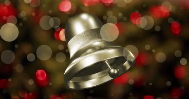 焦点を絞った点滅妖精の光の上にリンギング銀クリスマスベルのアニメーション クリスマス お祭り 伝統とお祝いのコンセプトデジタル生成ビデオ — ストック動画