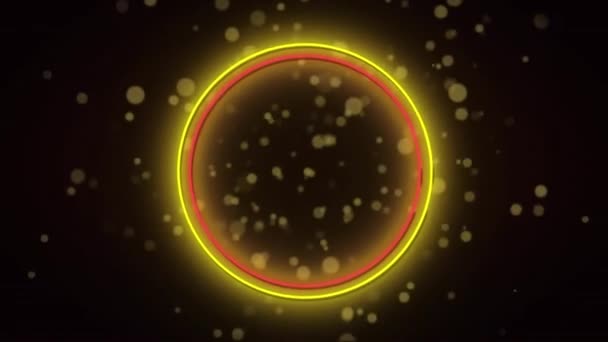 红色和黄色的霓虹灯环在黑色背景的亮点上的动画 圣诞节 派对和庆祝活动的概念 — 图库视频影像