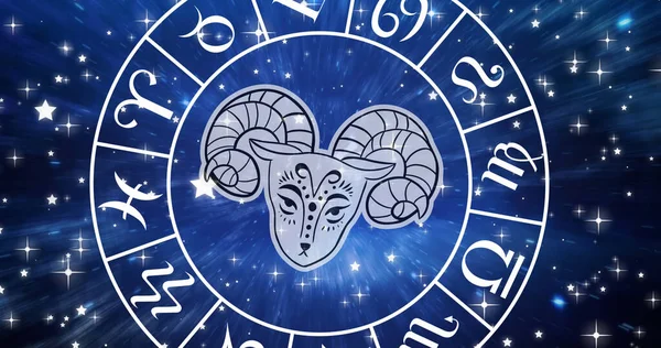 Image of aries star sign symbol in spinning horoscope wheel over glowing stars. horoscope and zodiac sign concept digitally generated image.