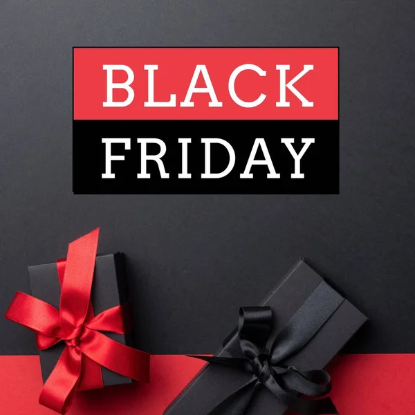 プレゼントの上に黒い金曜日のテキストの構成 ブラックフライデーとお祝いのコンセプトデジタル生成画像 — ストック写真