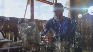 Animation of network of connections over caucasian businessman in office. Global business and digital interface concept digitally generated video.
