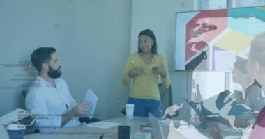 Animation of data processing over diverse business people in office. Global business and digital interface concept digitally generated video.