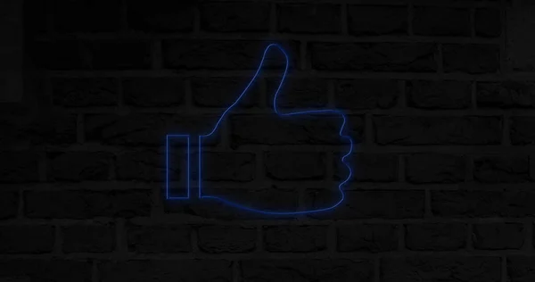 Composite of blue digital like button icon glowing against brick wall at night, copy space. Thumbs up, social media, positive emotion, illuminated, hand, symbol and feedback concept.