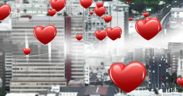 Image of hearts over cityscape. Social media, communication, global network, internet and new technology concept.