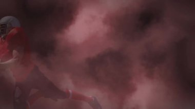 Kafkas erkek rugby oyuncusunun siyah bulutlarda fotokopi uzayına karşı topu tutuşu. Spor ve teknoloji kavramı