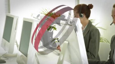 Animation of globe over diverse business people in office. Global business and digital interface concept digitally generated video.