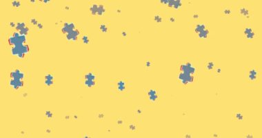 Sarı arkaplana düşen yapboz parçalarının dijital animasyonu, ortasında siyah bir yapboz simgesi ile.