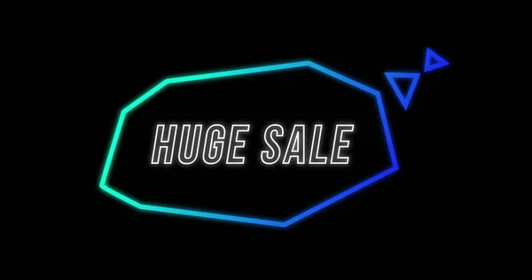 Image of Huge Sale advertisement in Retro Eighties concept with neon communication bubble against black background