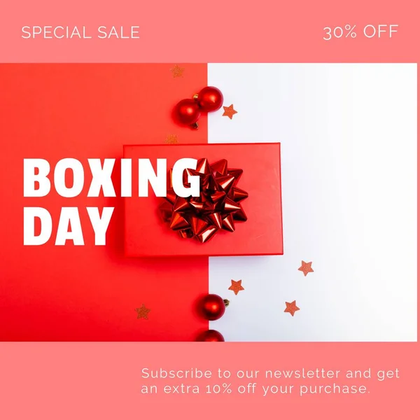 Composition of boxing day sales text over christmas decorations on white and red background. Christmas, boxing day, sales, festivity, celebration and tradition concept digitally.