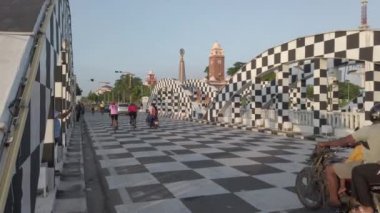 Chennai, India - July 30th 2022: The Chennai Napier Bridge has been transformed into a chessboard in preparation for the 44th Chess Olympiad 2022. People are visiting Napier Bridge and taking Pictures