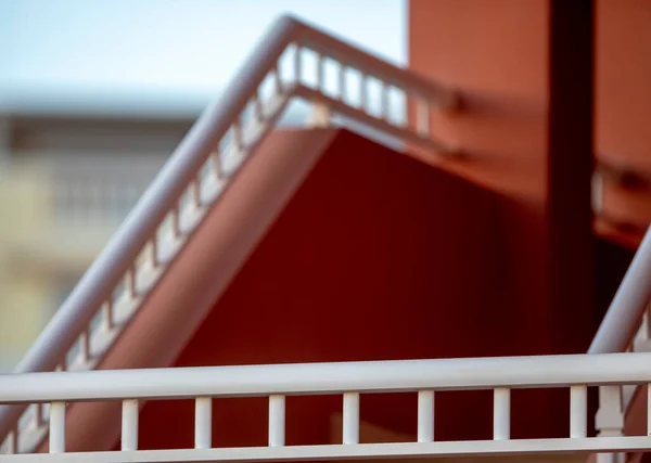 Exterior staircase details, white railings, architectural detail