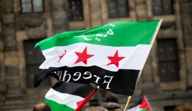 Waving flag of the Syrian Arab Republic in Amsterdam. 2021 05 22