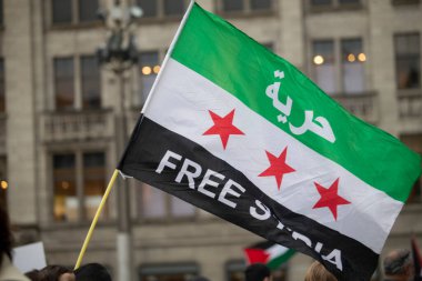 Waving flag of the Syrian Arab Republic in Amsterdam. 2021 05 22