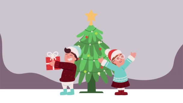 Niños de Navidad celebrando con el árbol — Vídeo de stock