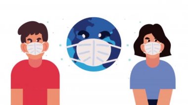 Çift ve dünya yüz maskesi takıyor.